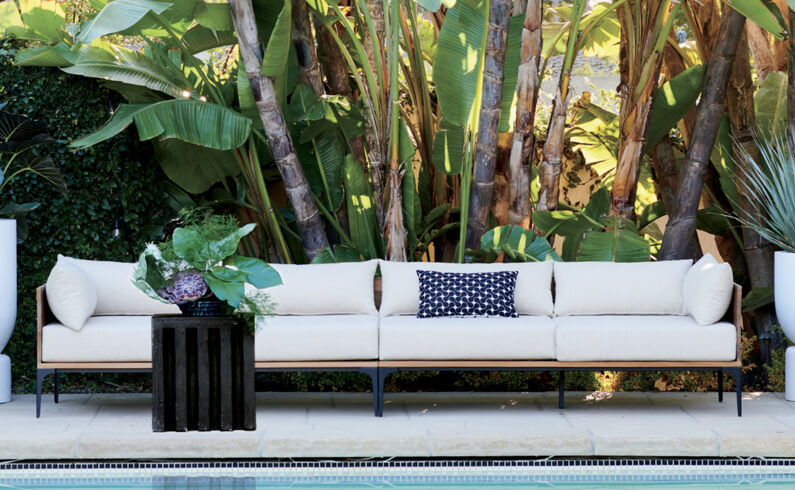 Outdoor pool couch and trees