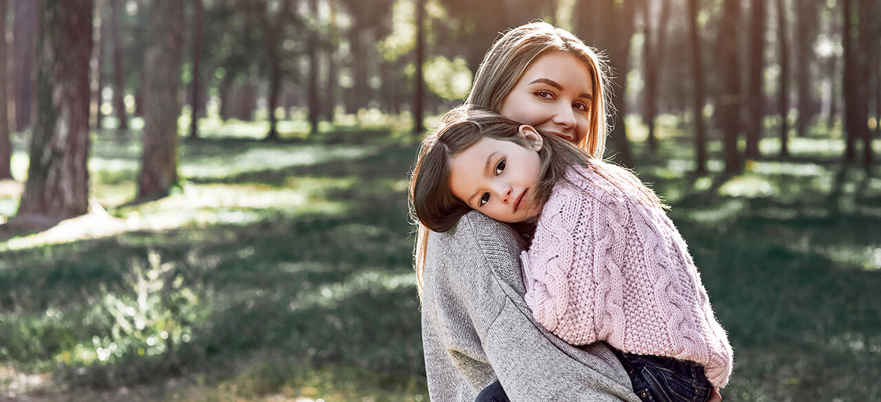 Mother holding her child